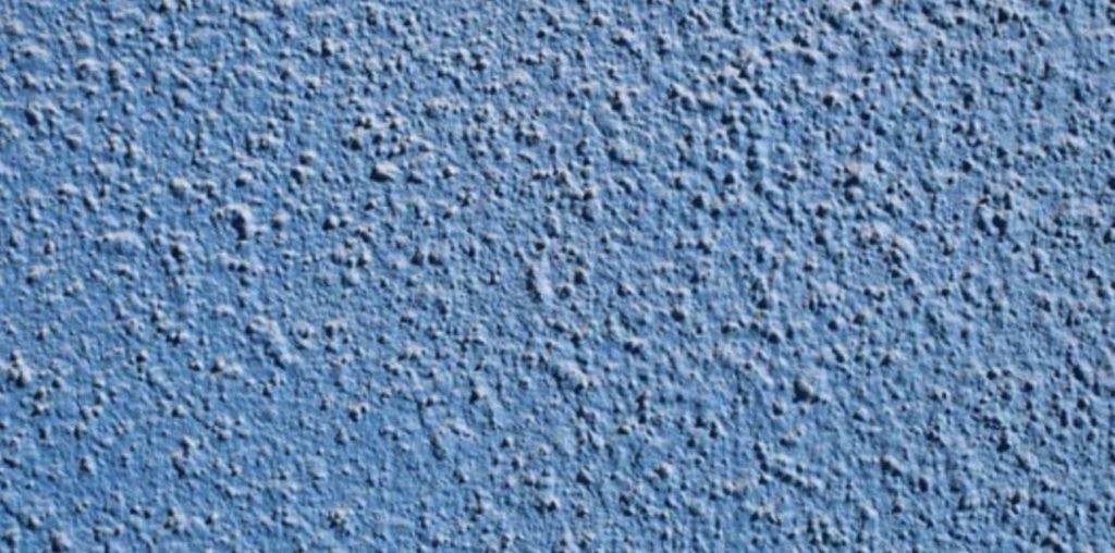 Which factors influence the cost of popcorn ceiling removal