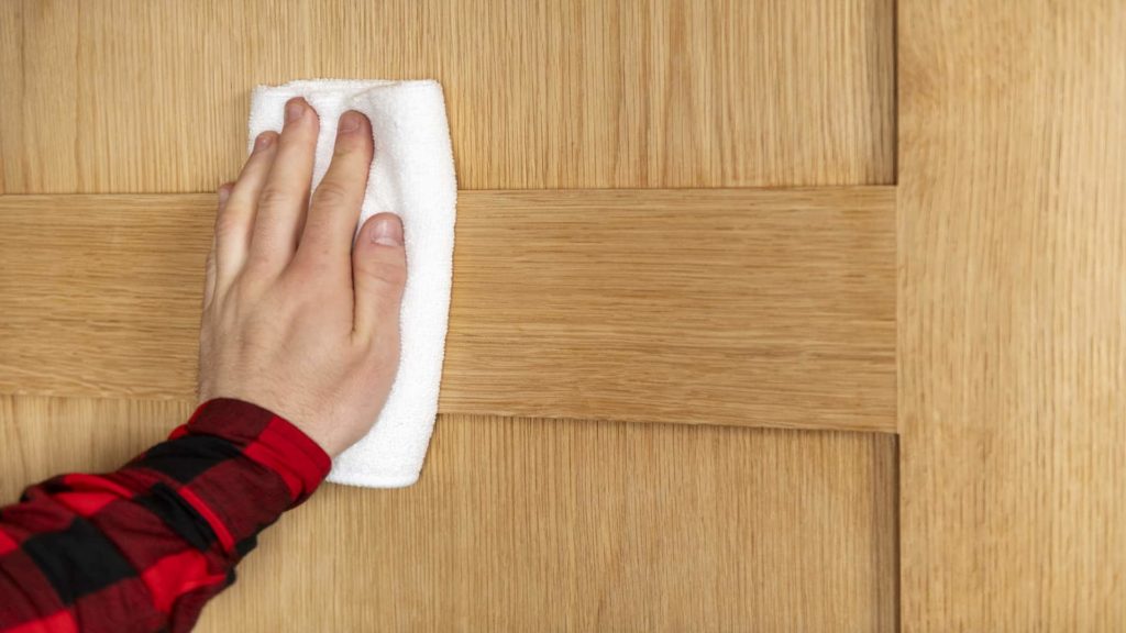 Monitor humidity levels to protect wood doors