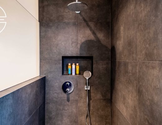 How much does it cost to retile a shower area